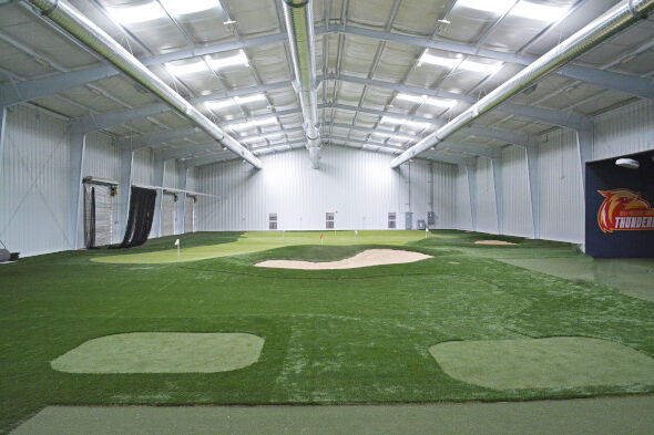 Metro New York indoor putting facility with tee boxes